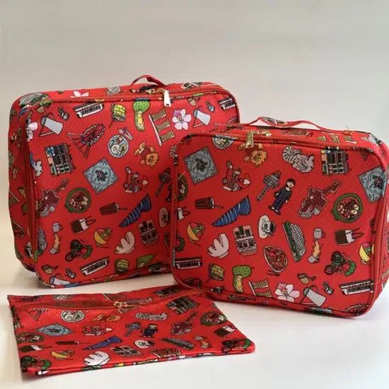 Custom 3-piece travel organizer pouch set featuring artist-designed prints
