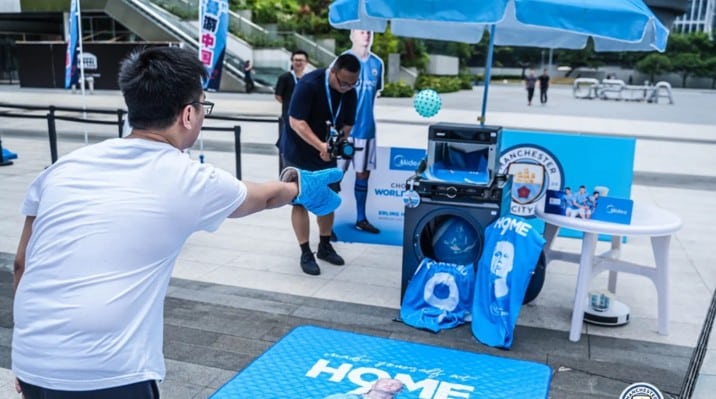 Midea ManCity merchandise at event