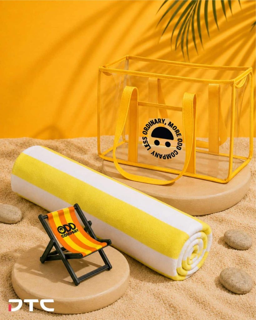 Odd Company merchandise collection featuring phone stand, towel and PVC bag