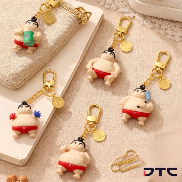 Sumo character keychain series featuring five custom designs
