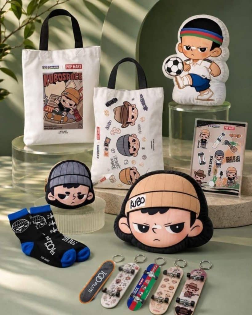 100PLUS x POP MART KUBO merchandise collection featuring tote bags, keychains, socks and cushions