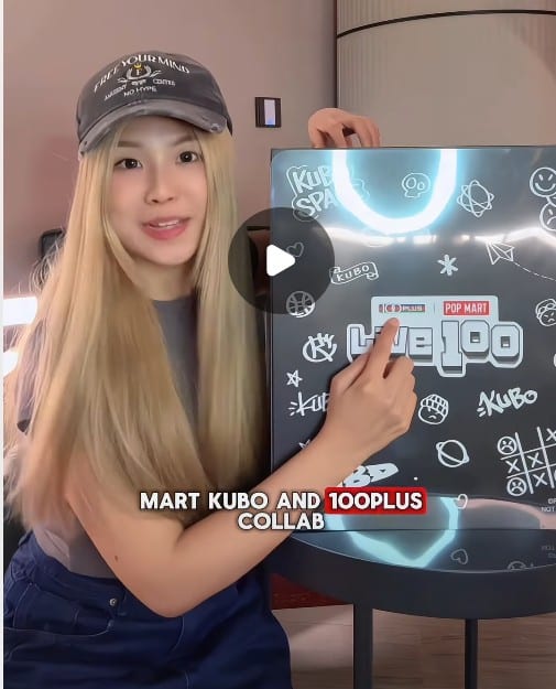 Creator unboxing PR kit featuring 100PLUS x POP MART KUBO campaign merchandise in Singapore