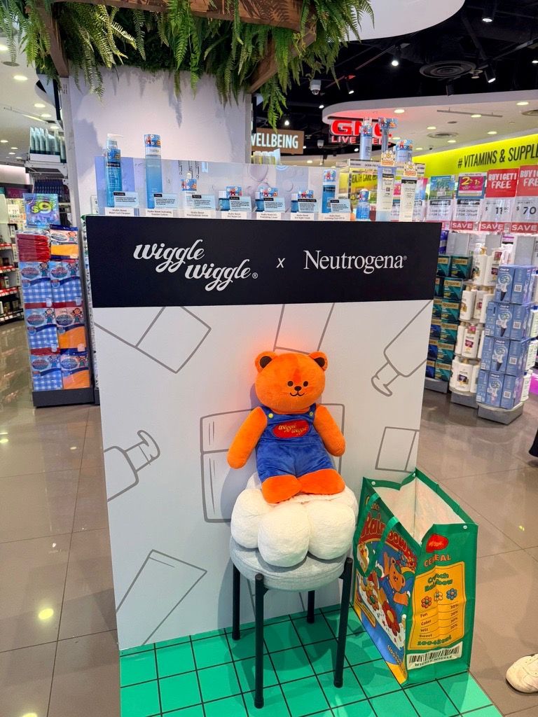 Neutrogena × Wiggle Wiggle retail activation booth with custom POSM designed by DTC World