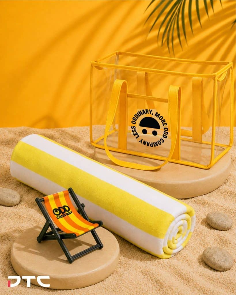 Odd Company merchandise collection featuring phone stand, towel and PVC bag
