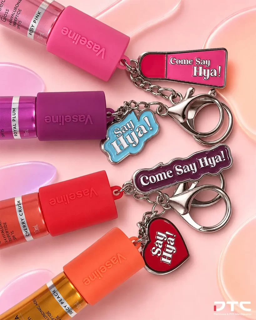 Four Vaseline Gluta-Hya Lip Serum Gloss keychains produced by DTC World